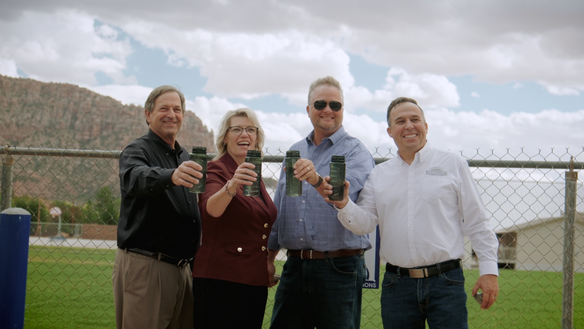 Guests celebrating at the Maxwell Park ribbon cutting event